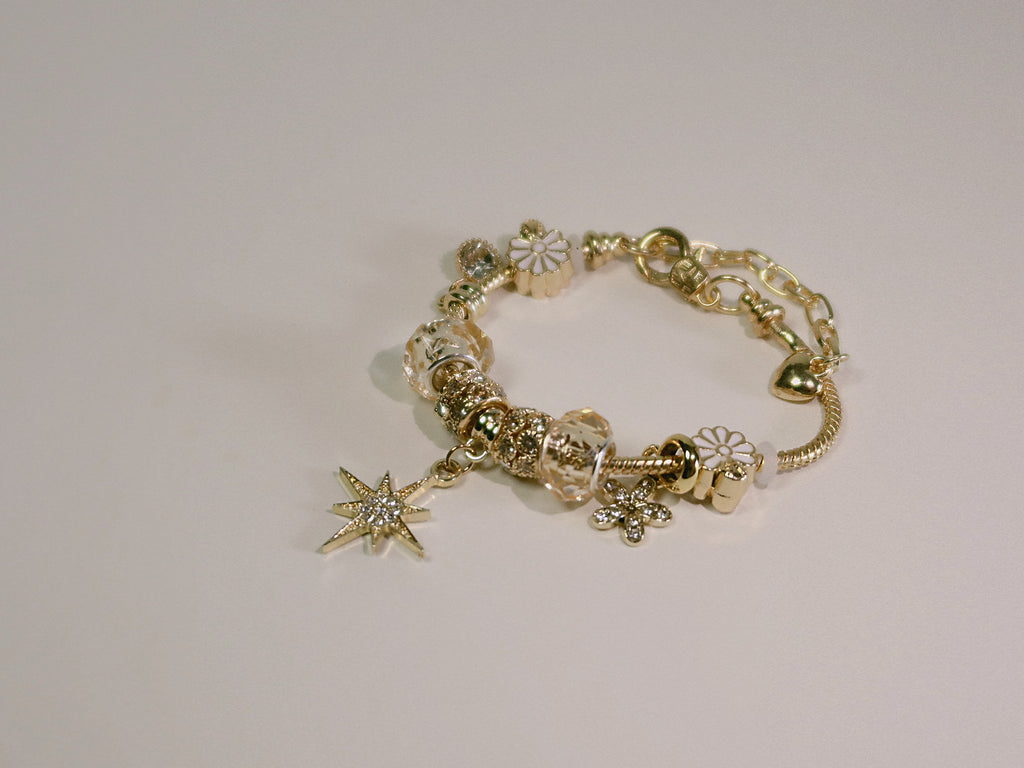 The Eosphorus. Gold Serpent Chain Starburst Bracelet