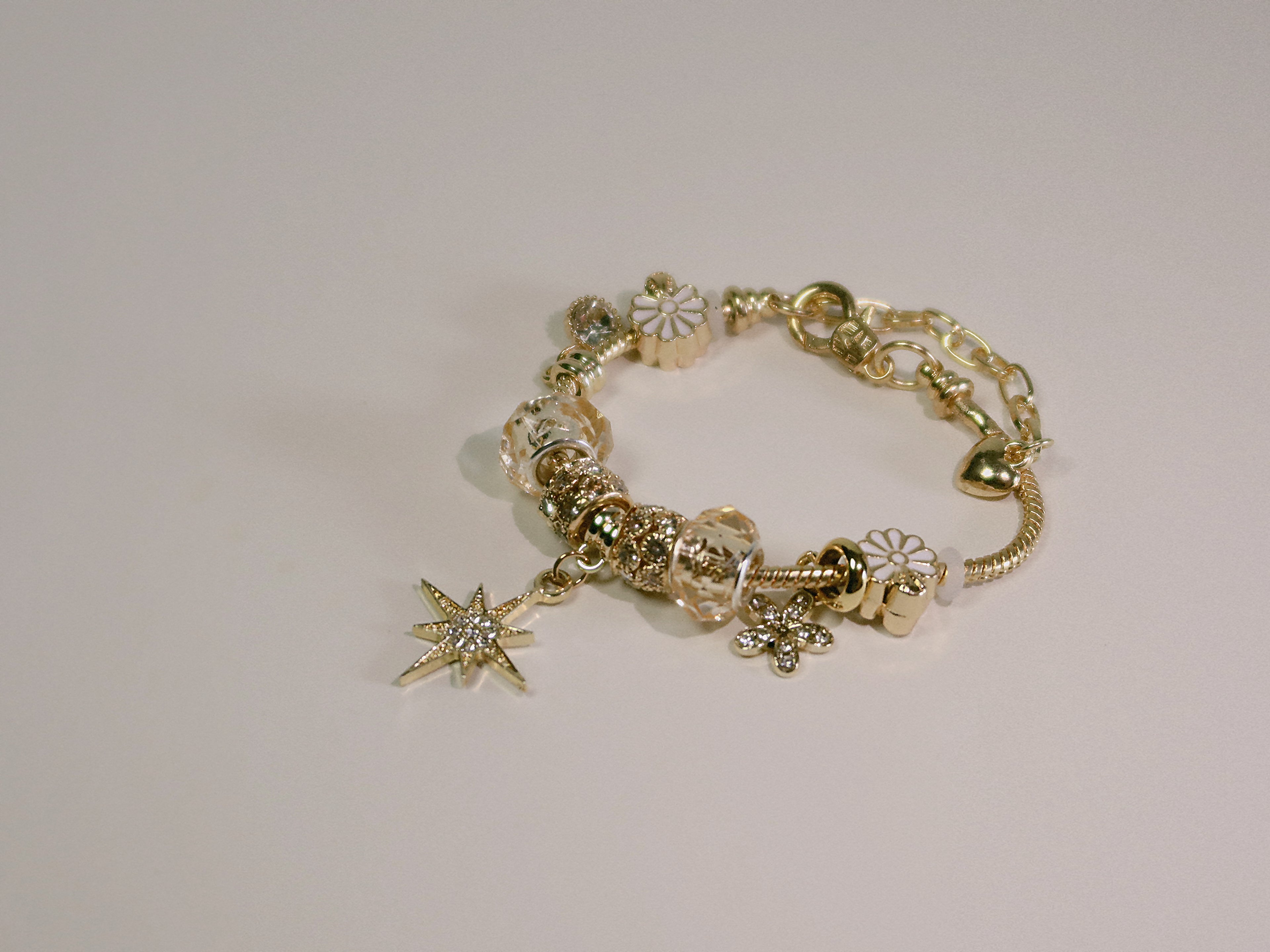 The Eosphorus. Gold Serpent Chain Starburst Bracelet